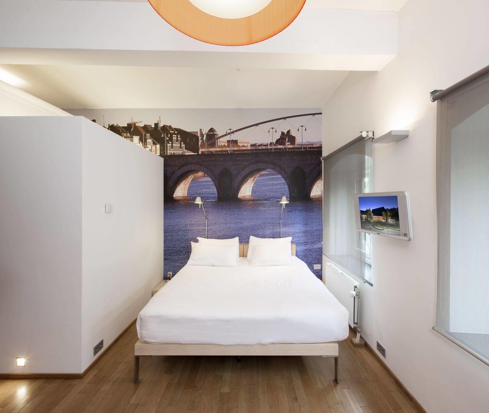 Kruisherenhotel Maastricht - Oostwegel Collection, Member Of Design Hotels Eksteriør bilde A room at the hotel